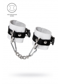 Бело-черные кожаные наручники с одним ремешком с люверсами - Pecado - купить с доставкой в Кургане